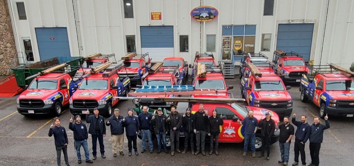 parked service trucks with crew