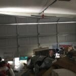 stage-3-door-off-track-excessive-clutter-in-the-garage